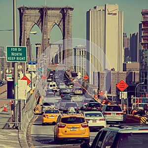 Cars crossing Brooklyn Bridge