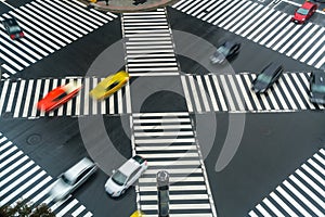 cars crossing busy intersection, Sukiyabashi, Ginza, Tokyo