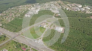 Cars drive through the solar part of the road, aerial view