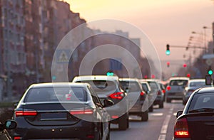 Cars driving on city street traffic jam