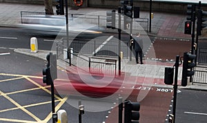 Cars driving through crosswalk