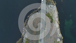 Cars are going on Atlantic Ocean Road in Norway. Aerial Vertical Top-Down View. Vertical Video