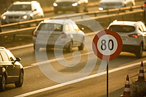 Cars going very slowly in a traffic jam during the morning rushhour