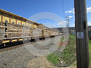 Cars with load of wood in West Haverstraw, NY.