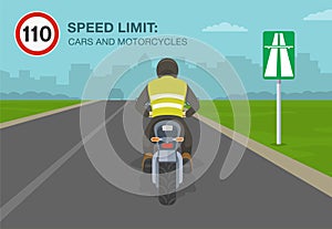 Cars and motorcycles on a motorway, highway speed limit. Back view of a motorcycle rider.