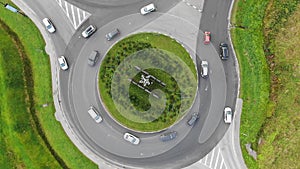 Cars moving along the roundabout, aerial view