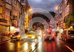 cars and night traffic lights in rainy city