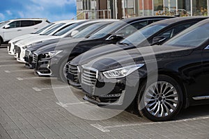 Cars parked at a car dealership stock