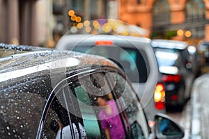 Cars parked in the city after rain