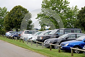 Cars parked in a field