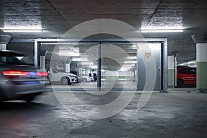 Cars parked in a garage with no people