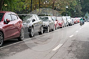 Cars parked on the urban street side