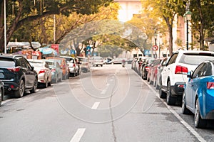 Cars parked on the urban street side