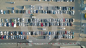 Cars in the parking lot near the shopping cente