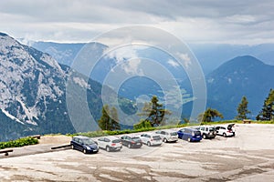 Cars parking under alpine mountain in Austria