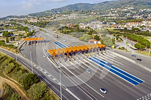 Cars Passing Through The Automatic Point Of Payment On A Toll Road photo