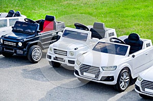 cars for rent for children in park. range of miniature recreational vehicles. electric cars for kids