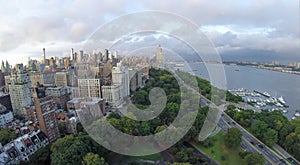 Cars ride by Henry Hudson Parkway near Riverside photo