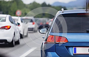 Cars in row on highway in traffic jam