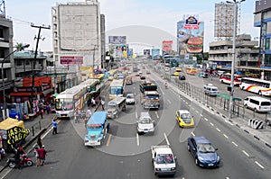 Cars running on street at EDSA in Manila, Philippines