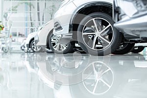 Cars For Sale, Automotive Industry, Cars Dealership Parking Lot. Rows of Brand New Vehicles Awaiting New Owners, on the epoxy