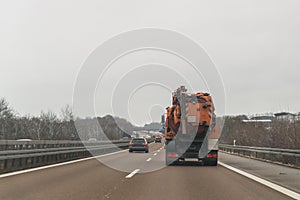 Cars and special purpose vehicle for wet waste disposal on an autobahn, Germany