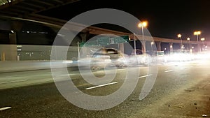 Cars speeding at night