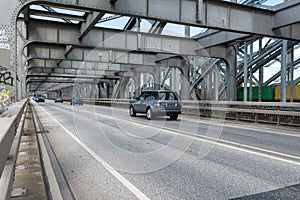 Cars on a steel road bridge