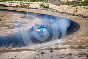 Cars on track drag racing