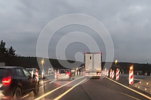 Cars and Truck at autobahn with road works, Germany