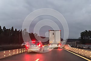 Cars and Truck at autobahn with road works, Germany