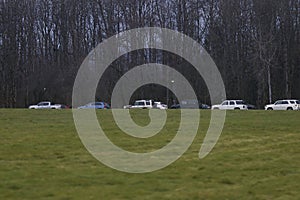 cars and trucks line up waiting for corona virus vacine