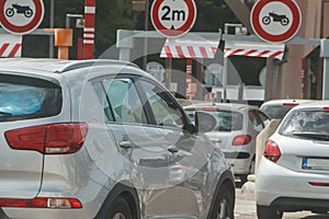 Cars waiting at the tollbooth