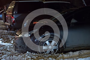 Cars on a winter night in a parking lot