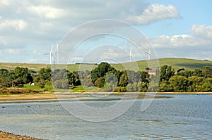 Carsington reservoir and wind generators.