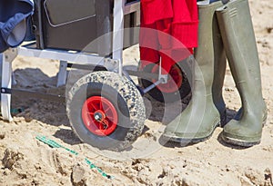 Cart for angling equipment on the beach photo