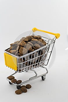 Cart with dog food on a white background