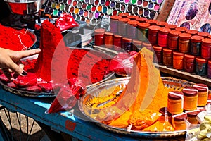 Cart with pigment powders for sale in the city of Pushkar