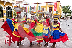Group of palenqueras selling fruits in Cartagena.
