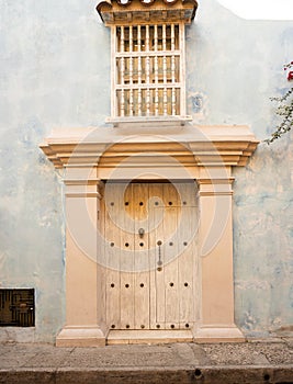 Cartagena`s elaborate door knockers date back to colonial times. There is a history behind each door. photo