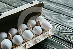 Carton box with white eggs