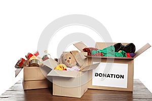 Carton boxes with donations on table