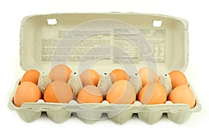 Carton of dozen brown eggs