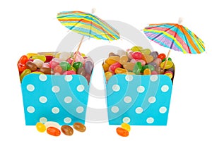 Cartons colorful candy with parasols