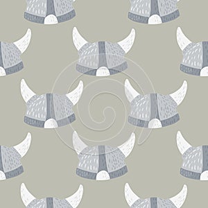 Cartoon ancient viking helmet silhouettes seamless pattern. Grey background with blue tones medieval armor print