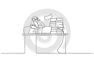 Cartoon of arab man frustated sitting on office busy desk concept of overwhelmed. Continuous line art