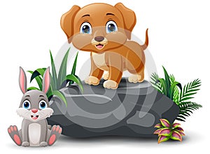 Cartoon baby dog and rabbit sitting on the stone