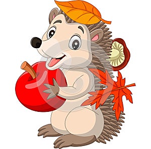 Cartoon baby hedgehog with red apple, autumn leaves and mushroom photo