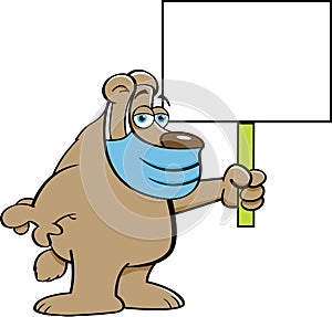 Cartoon bear wearing a protective mask while holding a sign.