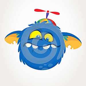Cartoon blue monster wearing funny hat. Vector illustration isolated.